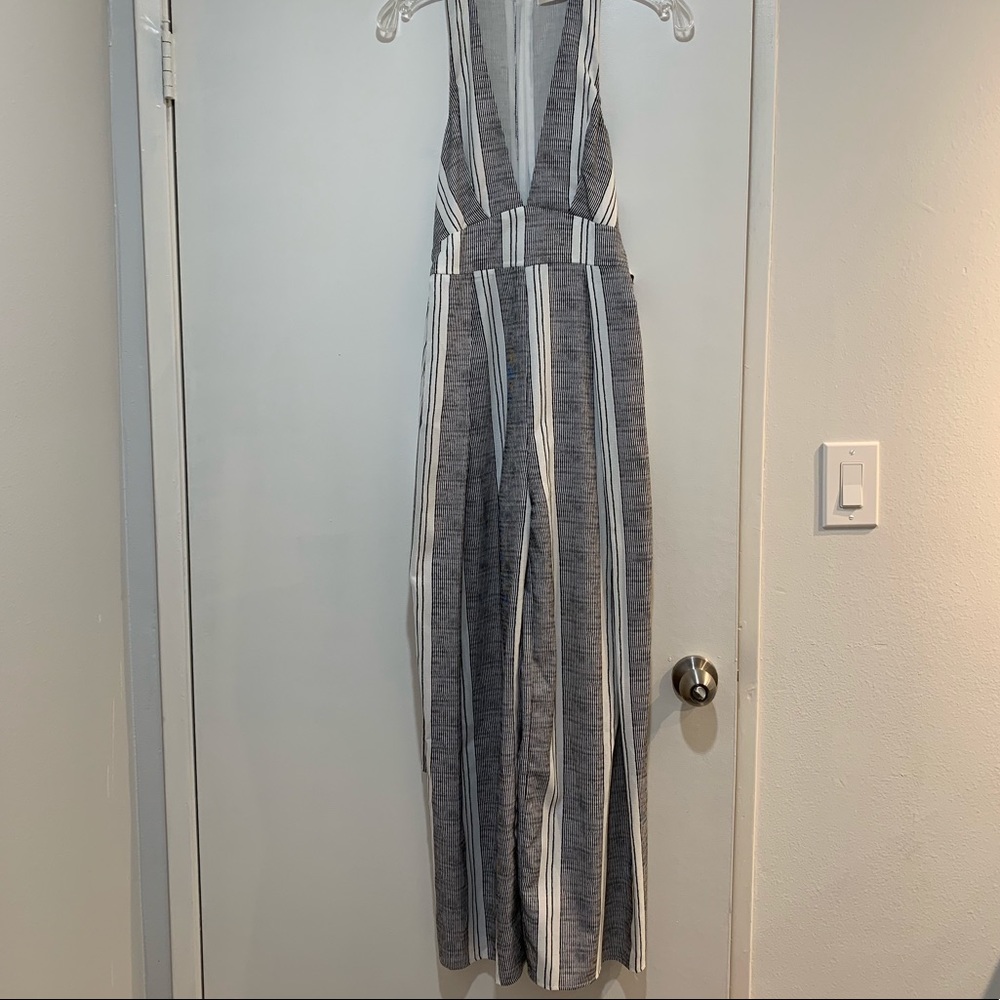 WHOIAM deep-v neck jumpsuit with tie back